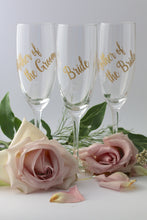 Personalised champagne glasses for the mother and fathers of the bride and groom